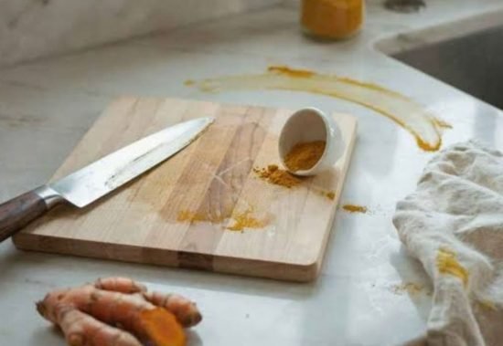 Remove turmeric stain fron wooden cutting board